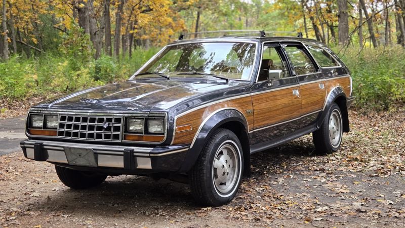 The 1988 Eagle Wagon head-on on a wooded road